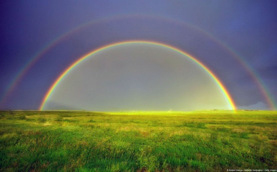 Double rainbow in a meadow, Silt, Colorado, U.S.